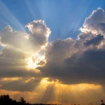 The Sun shining through clouds representing Thessalonian believers standing firm under opposition while expecting the Lord from heaven.